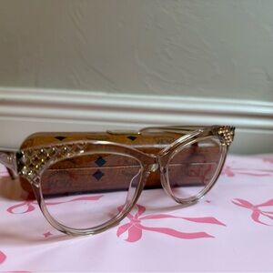 MCM Stylish Clear Glasses with Gold Accents